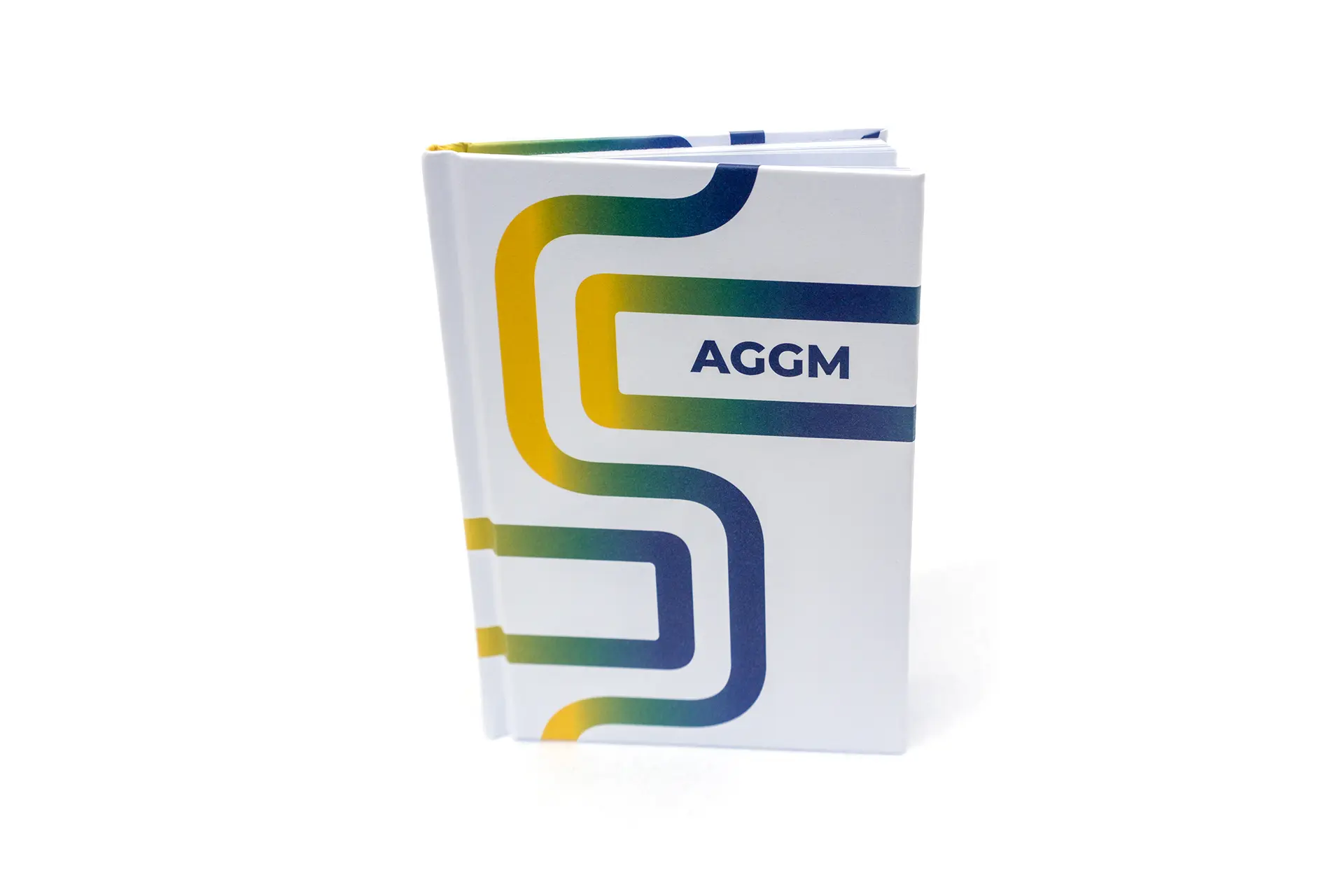 Notizbuch der AGGM – gestaltet von i-kiu.